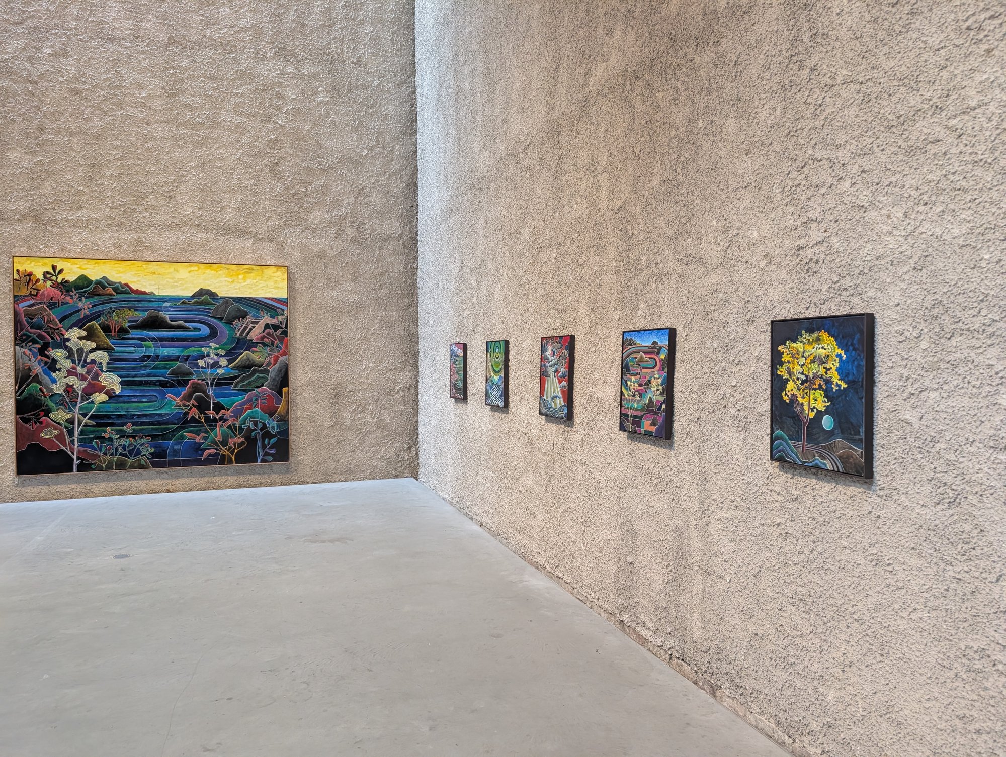 A river landscape under a yellow sky and a row of smaller landscapes, the tall hall at St. Agnes, KÖNIG GALERIE